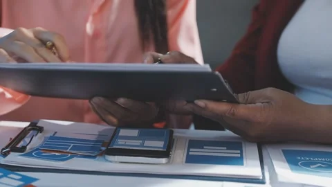 The designer team is designing the uxui system to make the uxui system work.. Stock Footage 290952005
