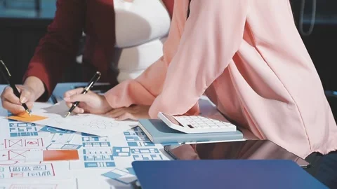 The designer team is designing the uxui system to make the uxui system work.. Stock Footage 290952913