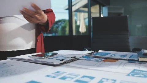 The designer team is designing the uxui system to make the uxui system work.. Stock Footage 290952920