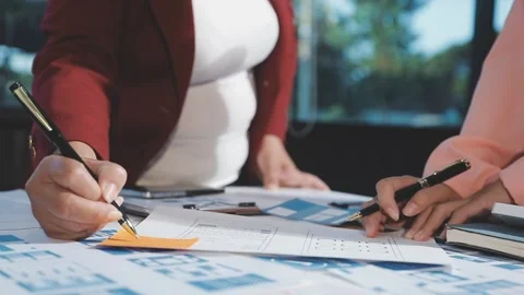 The designer team is designing the uxui system to make the uxui system work.. Stock Footage 290952944