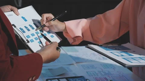 The designer team is designing the uxui system to make the uxui system work.. Stock Footage 290953588