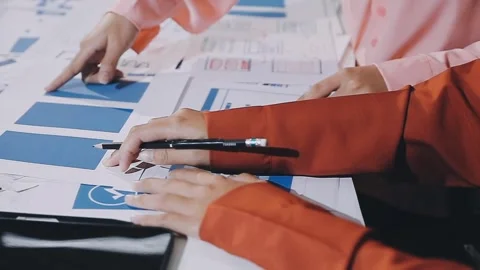 The designer team is designing the uxui system to make the uxui system work.. Stock Footage 308982617