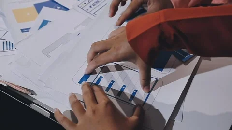 The designer team is designing the uxui system to make the uxui system work.. Stock Footage 308982649