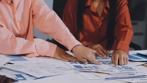 The designer team is designing the uxui system to make the uxui system work.. Stock Footage 308982682