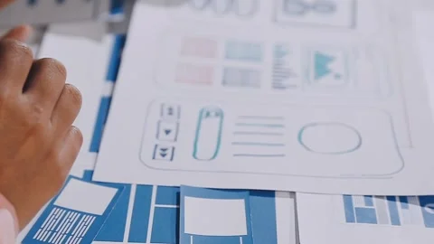 The designer team is designing the uxui system to make the uxui system work.. Stock Footage 308982707