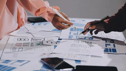 The designer team is designing the uxui system to make the uxui system work.. Stock Footage 308982729