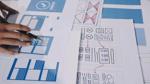 The designer team is designing the uxui system to make the uxui system work.. Stock Footage 308982748