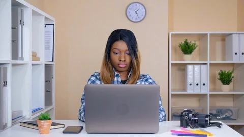 Designer typing on computer at work Stock Footage 117425799