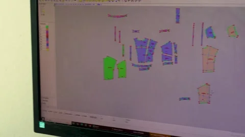 Designer Uses PC Screen for Leather Jacket Design, Izmir, Turkey - 4 SEP 2025 Stock Footage 322057178