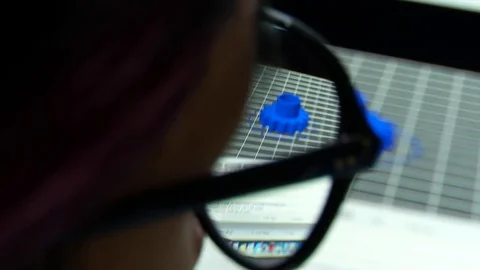 A designer is using a 3D modeling program to make a piece. 3D printer. Stock Footage 81366618
