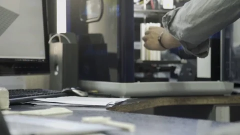 Designer using 3d printer and laptop computer, cropped Stock Footage 75170712