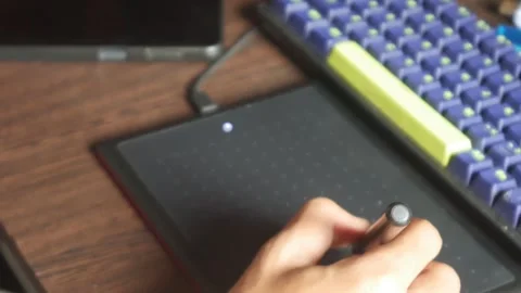 Designer using graphic tablet Stock Footage 302612584