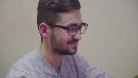 Designer using his smartphone - and have fun Vídeos de archivo 84966405