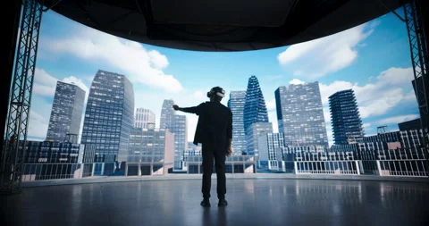 Designer Using VR with Screen Wall Creating City Buildings Stock Footage 318079307