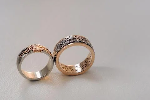 Designer wedding rings lying on the surface. Two wedding rings Stock Photos