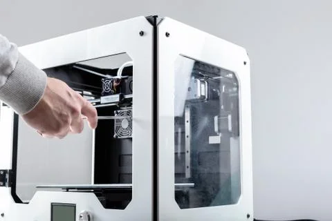 Designer Working With 3D Printer Foto stock
