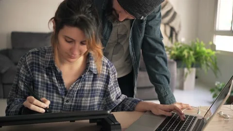 Designer working as a full-time freelance Stock Footage 130217597