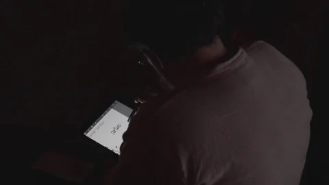 Designer working on his tablet Stockbeeldmateriaal 79812534