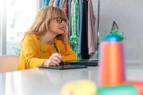 Designer working in office or workshop Stock Photos