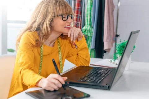 Designer working in office or workshop Stock Photos