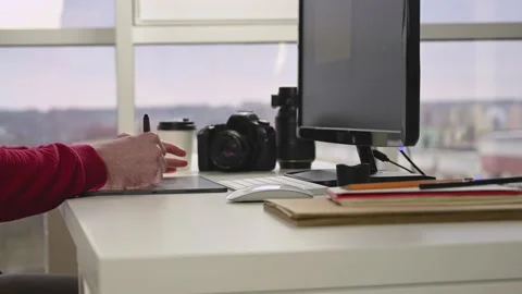 Designer working on project on tablet in office Stock Footage 143273701