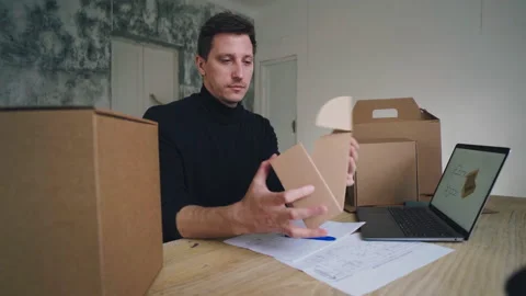 Designer works, develops packaging design using computer and drawing 動画素材 220687883