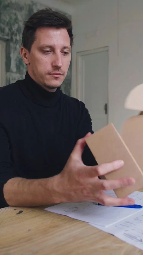 Designer works, develops packaging design using computer and drawing. Young 動画素材 308638542