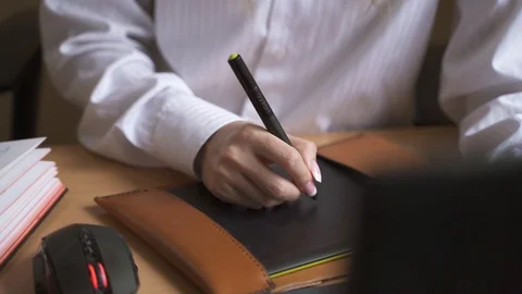 The designer works in the office Stock Footage 129612295