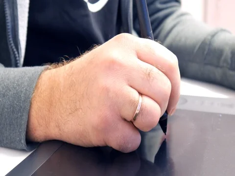 The designer works on a tablet Stock Footage 82299228