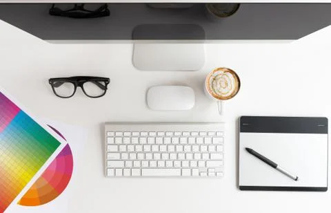 Designer workspace white table on top view Stock Photos