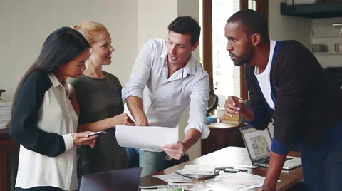 Designers discussing project Stock Footage 63302645