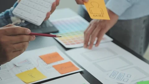 Designers drawing website ux app development. User experience concept. Stock Footage 247387512