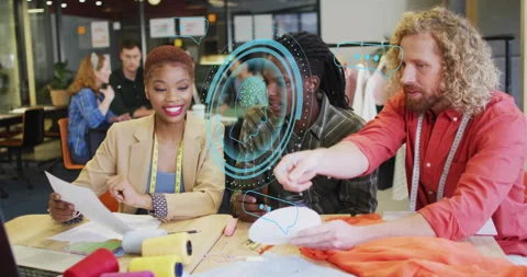 Designers holding printed pattern activating holographic 3D rotation for product Stock Footage 315537683