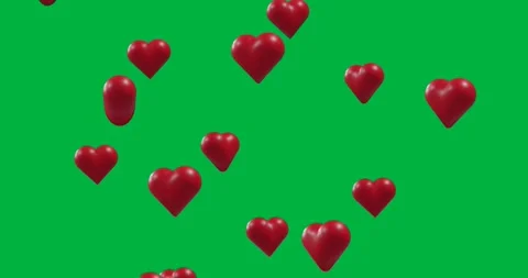 Designers using floating red heart icons on transparent backdrop, boosting Stock Footage 317480213