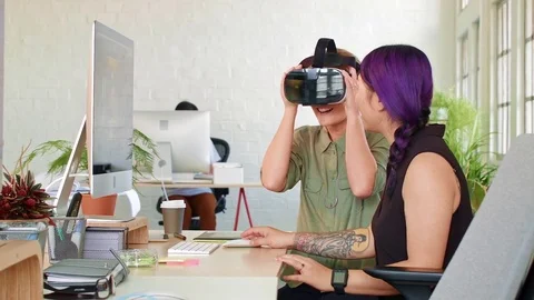 Designers using VR glasses Video stock 71632366