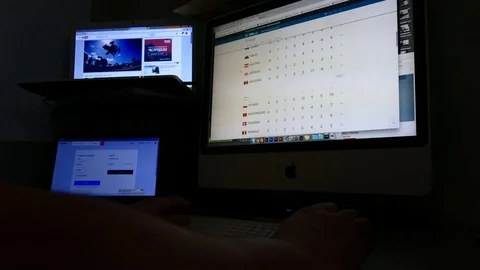 Designers Workplace timelapse. Computers, cameras graphics tablet phone on the Stock Footage 73484998
