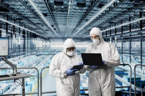 Designing microchip layout, EDA program and team of technicians Stock Photos