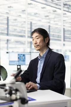 Designing microchip layout, semiconductor manufacturing and senior developer Stock Photos
