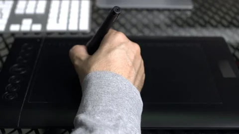 Designing with tablet and pen Stock Footage 200158957
