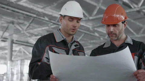 Designing Work of Manufacture by 30s Engineer. Male Labor Person in Protective H Stock Footage 199476113