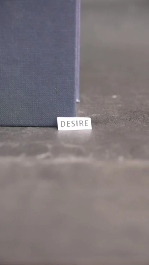 Desire Concept with Hand Placing Paper Label Stock Footage 338267835