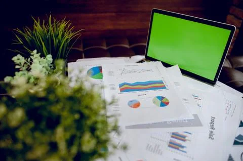 The desk and graph are placed on the business desk. Business concept With cop 스톡 사진