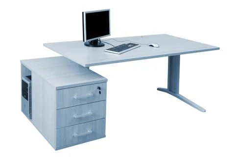 Desk and a modern computer Stock Photos