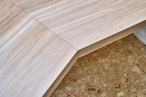 Desk with bleached solid oak mounted on white wall Stock Photos