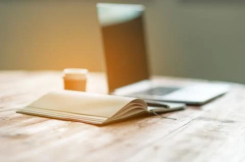 A desk with a business computer and a note on the desk. Business concept with Stock Photos