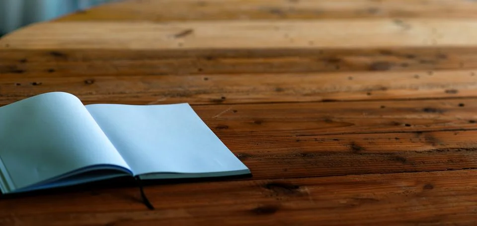A desk with a business computer and a note on the desk. Business concept wi.. Stock Photos