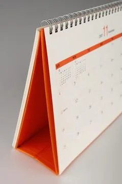 Desk calendar on gray background Stock Photos