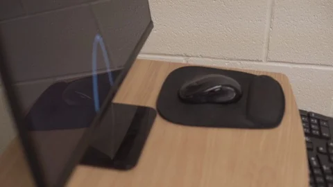 Desk Computer In Corner Of Room Screensaver Ribbons Slow Push To Mouse Stock Footage 87850635