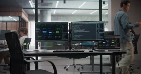 Desk with Computer Screens in Office Stock Footage 321012342