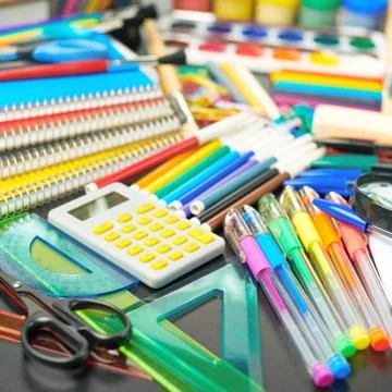 Desk covered with multiple stationery Stock Photos